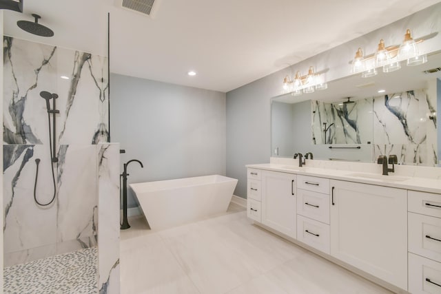 438 River Edge Rd, Jupiter, FL 33477 - full bath featuring a marble finish shower, double vanity, a freestanding tub, and recessed lighting