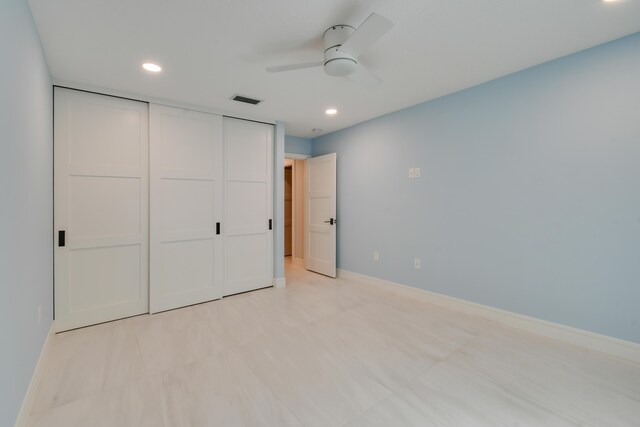 438 River Edge Rd, Jupiter, FL 33477 - unfurnished bedroom featuring baseboards, recessed lighting, a closet, and a ceiling fan