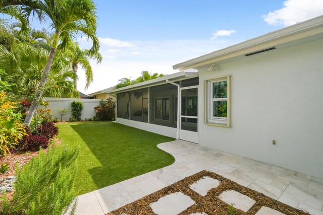 438 River Edge Rd, Jupiter, FL 33477 - view of yard with a sunroom