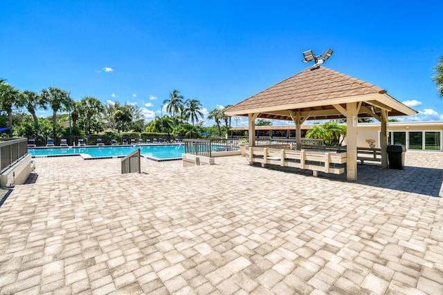 438 River Edge Rd, Jupiter, FL 33477 - community pool with a gazebo and a patio area