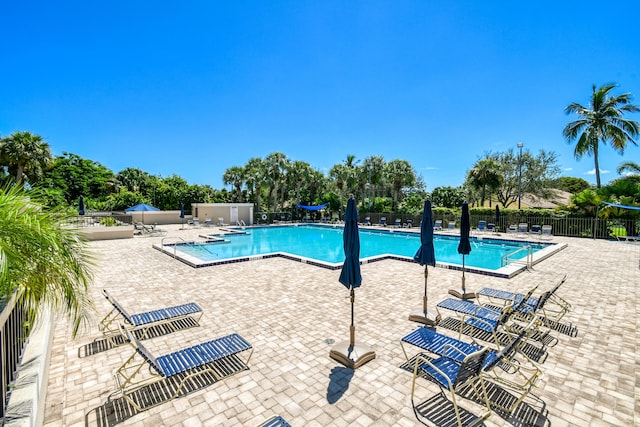 438 River Edge Rd, Jupiter, FL 33477 - community pool with a patio