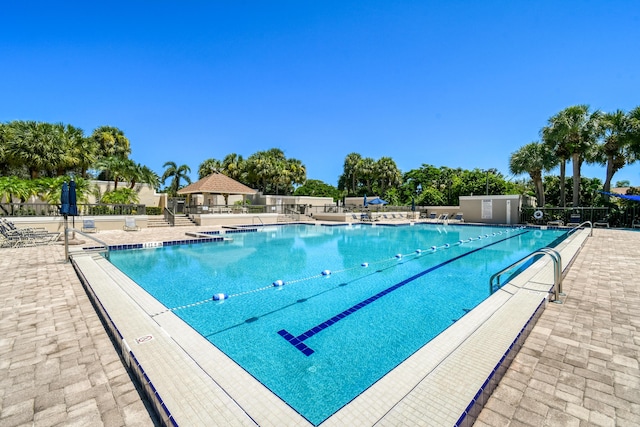 438 River Edge Rd, Jupiter, FL 33477 - community pool with a patio area
