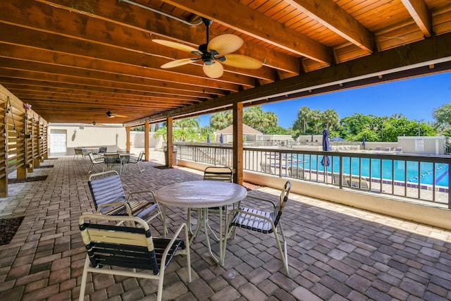 438 River Edge Rd, Jupiter, FL 33477 - fenced backyard featuring a ceiling fan, outdoor dining space, and a patio area