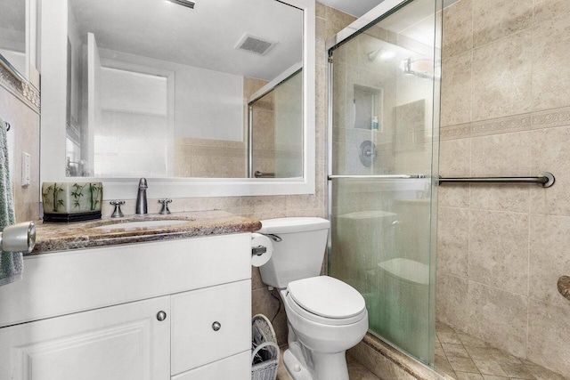 3101 S Ocean Blvd Unit 706, Highland Beach, FL 33487 - full bathroom featuring a shower stall, vanity, and toilet
