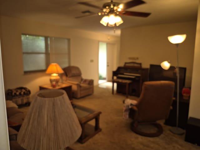 2897 SW Ortega St, Port Saint Lucie, FL 34953 - carpeted living room with ceiling fan
