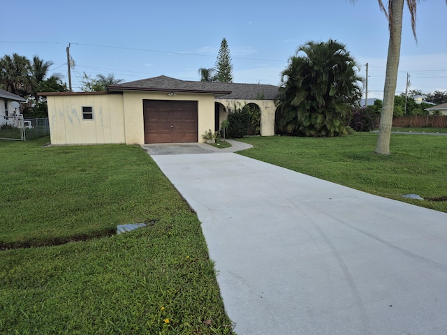 2897 SW Ortega St, Port Saint Lucie, FL 34953 - single story home with concrete driveway, a garage, stucco siding, and a shingled roof