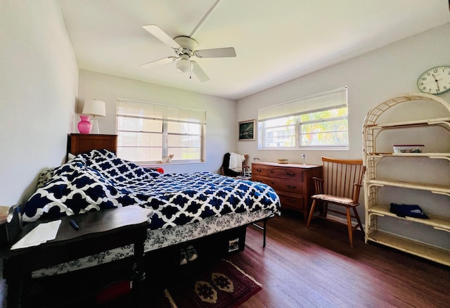 104 Cambridge E, West Palm Beach, FL 33417 - bedroom with dark wood finished floors and a ceiling fan
