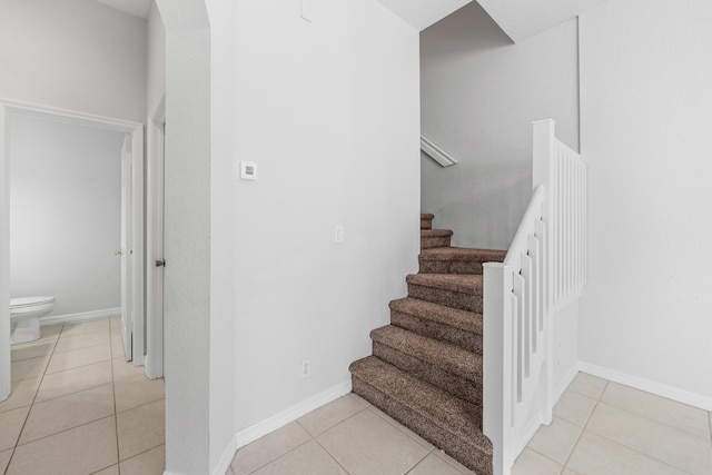 5554 Boynton Gardens Dr, Boynton Beach, FL 33437 - stairway featuring tile patterned floors and baseboards