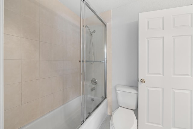 5554 Boynton Gardens Dr, Boynton Beach, FL 33437 - bathroom featuring toilet and enclosed tub / shower combo
