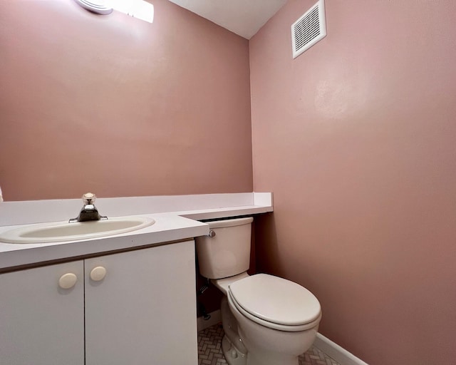80 Norwich D, West Palm Beach, FL 33417 - bathroom featuring toilet and vanity