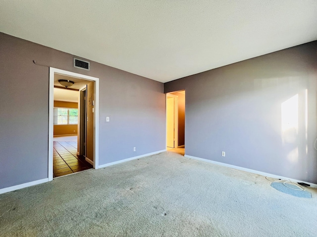 80 Norwich D, West Palm Beach, FL 33417 - empty room featuring carpet floors and baseboards