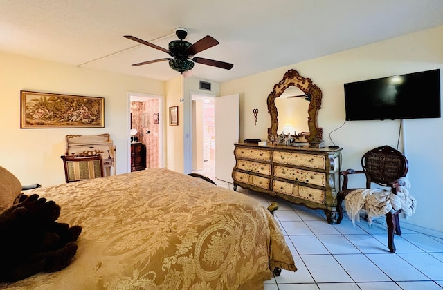 226 Wellington Unit G, West Palm Beach, FL 33417 - bedroom with tile patterned floors and ceiling fan
