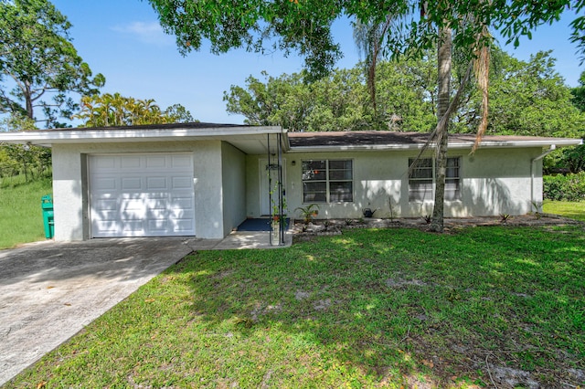6506 Kings Hwy, Fort Pierce, FL 34951 - view of front facade featuring an attached garage, stucco siding, a front yard, and concrete driveway
