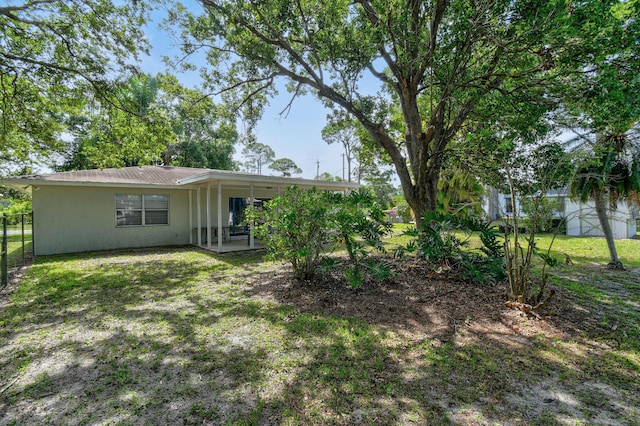 6506 Kings Hwy, Fort Pierce, FL 34951 - rear view of property with stucco siding