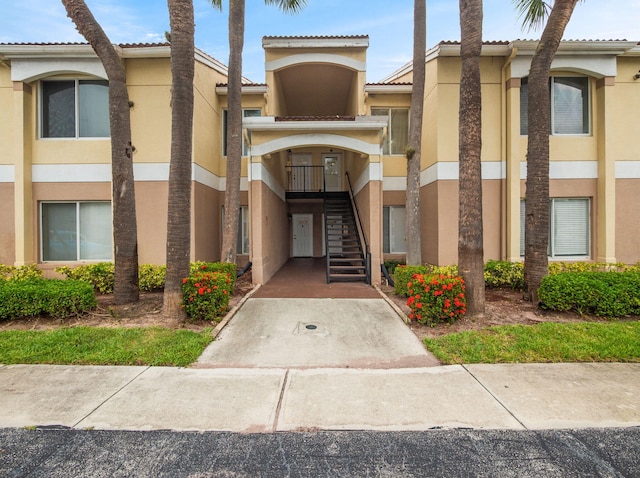 815 W Boynton Beach Blvd Unit 15-203, Boynton Beach, FL 33426 - view of building exterior featuring stairs