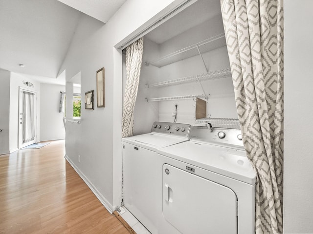 815 W Boynton Beach Blvd Unit 15-203, Boynton Beach, FL 33426 - washroom with independent washer and dryer, light wood-type flooring, and baseboards