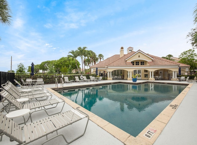 815 W Boynton Beach Blvd Unit 15-203, Boynton Beach, FL 33426 - community pool with a patio and french doors