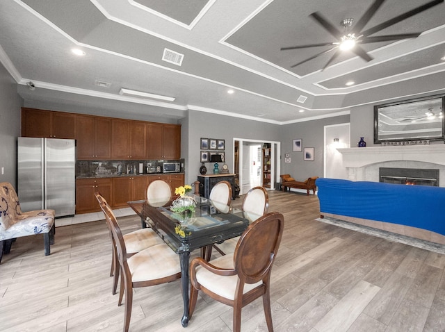 815 W Boynton Beach Blvd Unit 15-203, Boynton Beach, FL 33426 - dining space featuring a ceiling fan, ornamental molding, light wood-type flooring, recessed lighting, and a fireplace