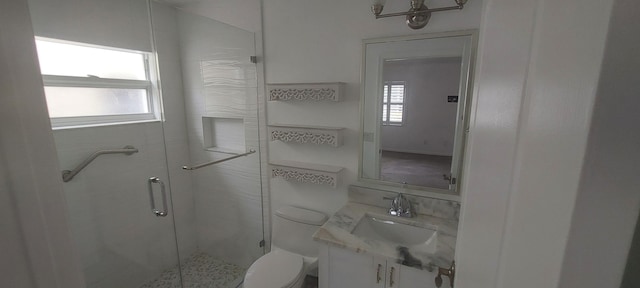 456 NW Marsala Ter, Port Saint Lucie, FL 34986 - bathroom featuring toilet, vanity, and a stall shower