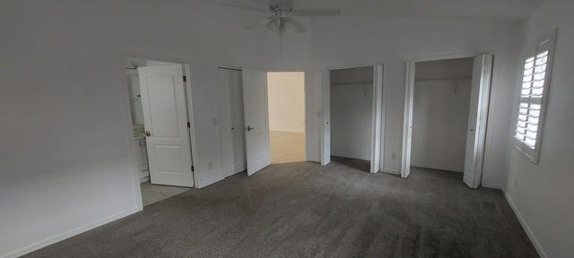 456 NW Marsala Ter, Port Saint Lucie, FL 34986 - unfurnished bedroom featuring two closets, carpet floors, multiple windows, and baseboards