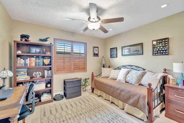 519 SE Brookside Ter, Port Saint Lucie, FL 34983 - bedroom with a desk, a textured ceiling, ceiling fan, and recessed lighting