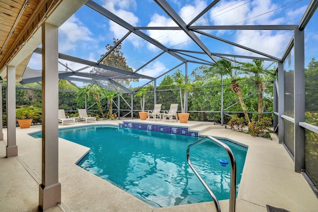 519 SE Brookside Ter, Port Saint Lucie, FL 34983 - swimming pool featuring a patio and a lanai