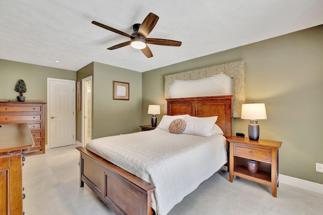519 SE Brookside Ter, Port Saint Lucie, FL 34983 - bedroom with ceiling fan and baseboards