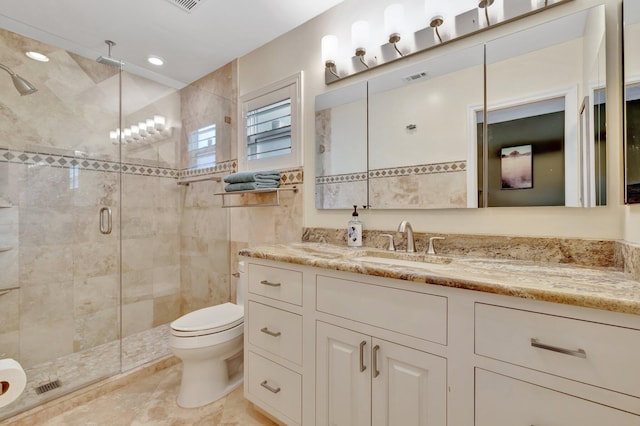 519 SE Brookside Ter, Port Saint Lucie, FL 34983 - bathroom featuring a stall shower, vanity, and toilet