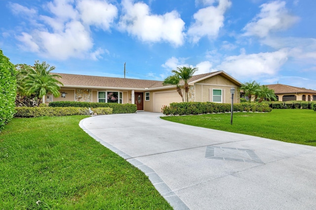 519 SE Brookside Ter, Port Saint Lucie, FL 34983 - ranch-style home featuring an attached garage, a front lawn, driveway, and stucco siding