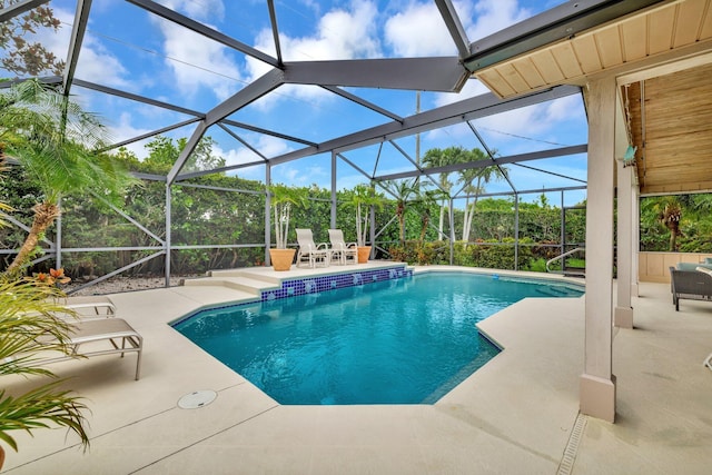 519 SE Brookside Ter, Port Saint Lucie, FL 34983 - outdoor pool with a patio area and a lanai