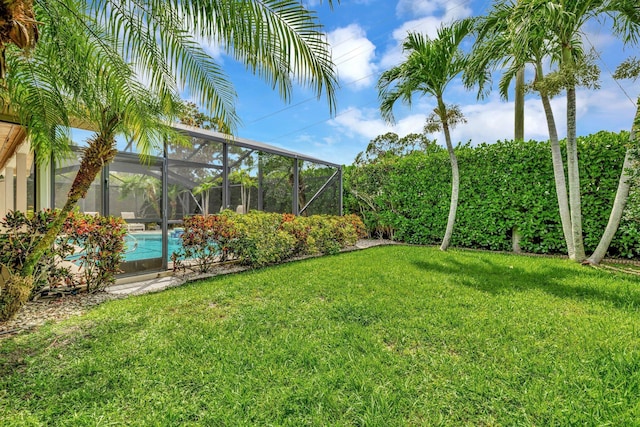 519 SE Brookside Ter, Port Saint Lucie, FL 34983 - view of grassy yard with an outdoor pool