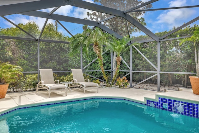 519 SE Brookside Ter, Port Saint Lucie, FL 34983 - outdoor pool with a lanai and a patio area