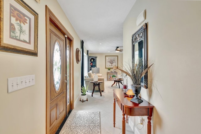 519 SE Brookside Ter, Port Saint Lucie, FL 34983 - entryway with light tile patterned flooring and baseboards