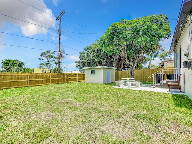 903 21st St, West Palm Beach, FL 33407 - view of yard featuring a patio