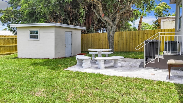 903 21st St, West Palm Beach, FL 33407 - view of yard featuring a patio
