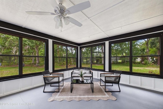 2318 Old Samsula Rd, Port Orange, FL 32128 - sunroom with plenty of natural light, a ceiling fan, and an outdoor living space