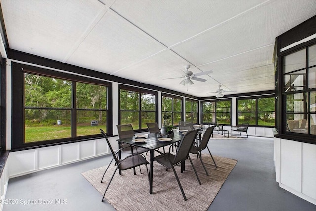 2318 Old Samsula Rd, Port Orange, FL 32128 - sunroom with a ceiling fan and outdoor dining area