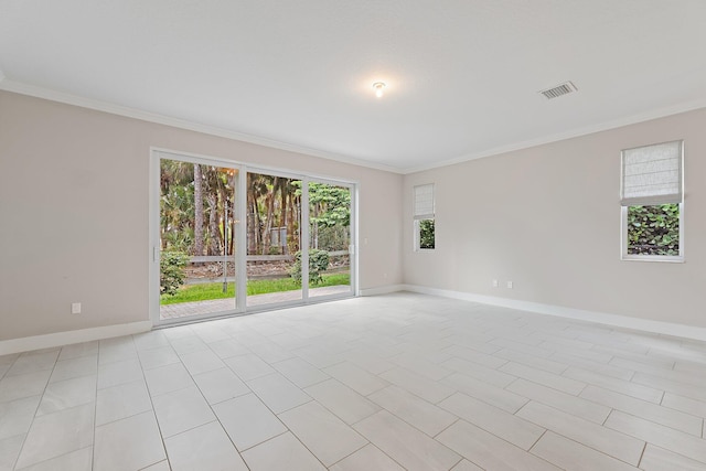 6825 Pointe Of Woods Dr, West Palm Beach, FL 33413 - spare room featuring baseboards, ornamental molding, and light tile patterned floors