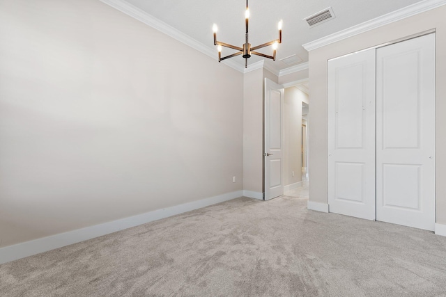 6825 Pointe Of Woods Dr, West Palm Beach, FL 33413 - unfurnished bedroom featuring ornamental molding, a chandelier, carpet flooring, a closet, and baseboards