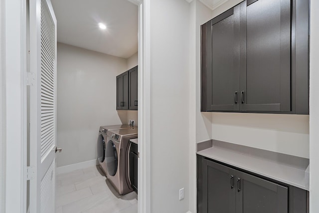 6825 Pointe Of Woods Dr, West Palm Beach, FL 33413 - laundry room featuring cabinet space, independent washer and dryer, baseboards, and recessed lighting