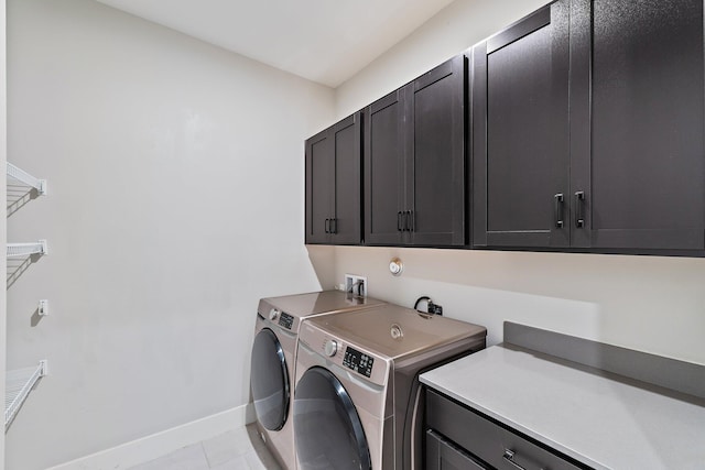 6825 Pointe Of Woods Dr, West Palm Beach, FL 33413 - washroom featuring cabinet space, baseboards, separate washer and dryer, and light tile patterned floors