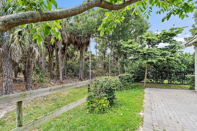 6825 Pointe Of Woods Dr, West Palm Beach, FL 33413 - view of grassy yard with a patio