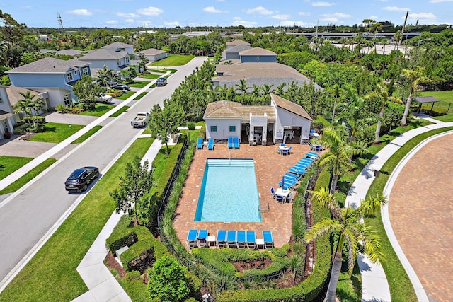 6825 Pointe Of Woods Dr, West Palm Beach, FL 33413 - aerial view of residential area featuring a pool and a tree filled landscape