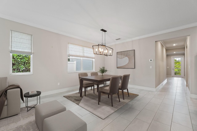 6825 Pointe Of Woods Dr, West Palm Beach, FL 33413 - dining room featuring ornamental molding, a chandelier, baseboards, and light tile patterned floors