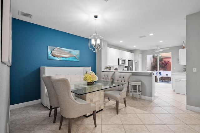 2381 SW Island Creek Trl, Palm City, FL 34990 - dining area featuring a chandelier, recessed lighting, light tile patterned floors, baseboards, and ceiling fan