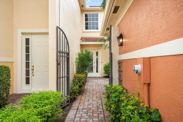 2381 SW Island Creek Trl, Palm City, FL 34990 - entrance to property featuring stucco siding