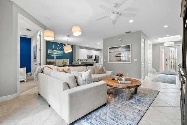 2381 SW Island Creek Trl, Palm City, FL 34990 - living room featuring an AC wall unit, light tile patterned floors, baseboards, ceiling fan, and recessed lighting
