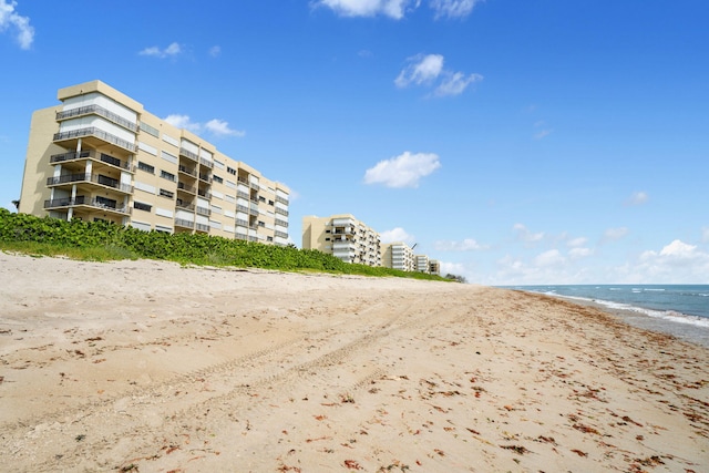 7420 S Ocean Dr Unit 314, Jensen Beach, FL 34957 - view of apartment building / complex with view of water and beach