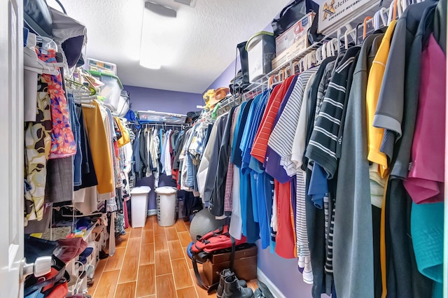 320 Summa St, West Palm Beach, FL 33405 - walk in closet featuring wood finished floors
