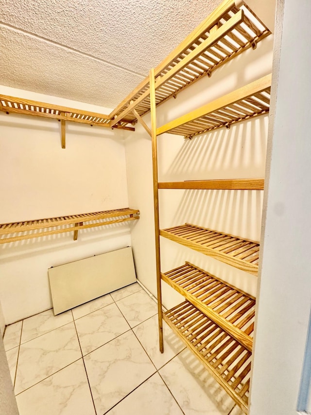200 Village Green Cir E Unit 102, Palm Springs, FL 33461 - spacious closet featuring marble finish floors